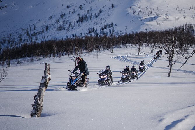 Adventure Snowmobile Safari - The lavvu meal at Camp Tamok: warm food, open fire, and Sámi tent vibes