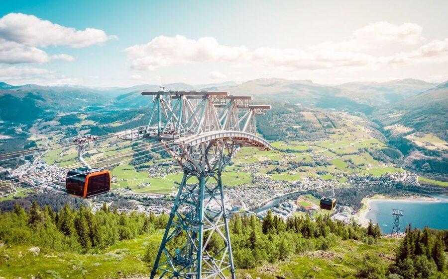 Bergen: Hardangerfjord, Voss Gondola & 3 Great Waterfalls - Strandkaien departure, minibus comfort, and the Hardangerfjord story on the way