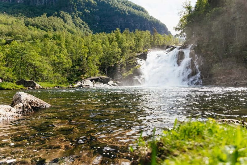 Bergen: Old Town and Waterfalls Guided Tour with Waffles - Steinsdalsfossen: the waterfall stop where you can walk behind it