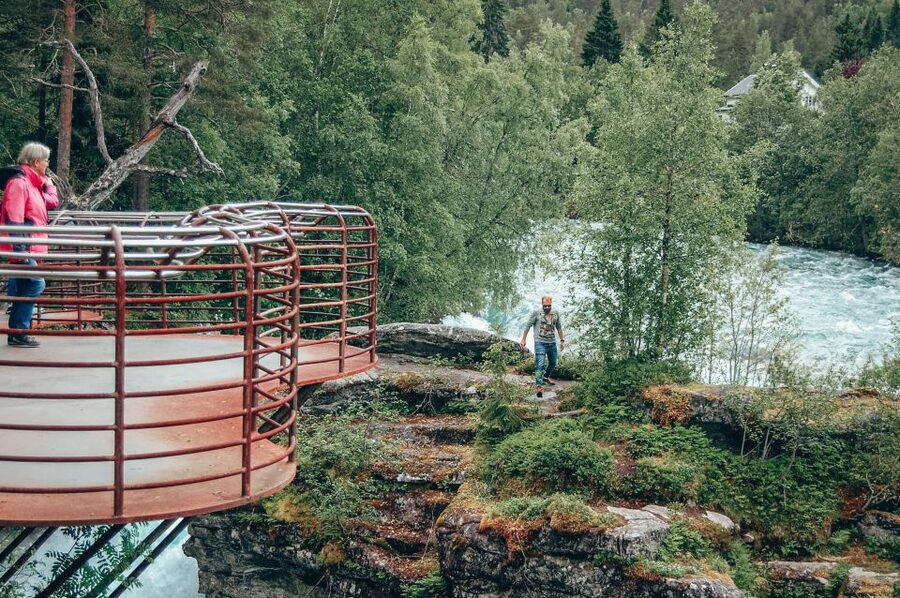 From Ålesund: Trollstigen Sightseeing Village & Fjord Tour - Stigefossen waterfall, 240 meters of power on your route
