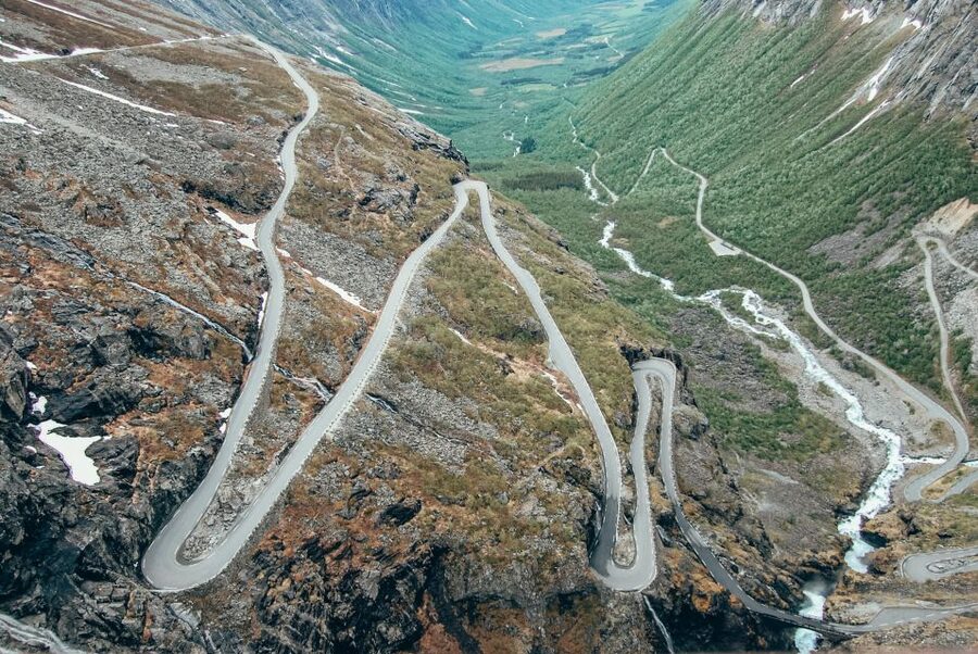 From Ålesund: Trollstigen Sightseeing Village & Fjord Tour - Troll Wall and Trollvegen, ending with rock scale you cannot fake