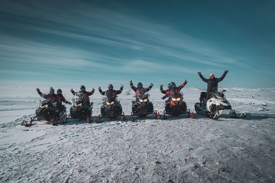 From Alta: Daytime Snowmobile Adventure - Your snowmobile training starts with gear and a safety briefing