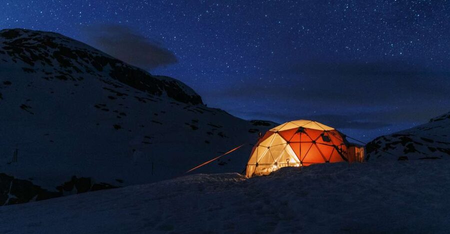 From Skjeggedal: Trolltunga Sunset Winter Overnight tour - The climb with base camp reset, and why leaving backpacks helps