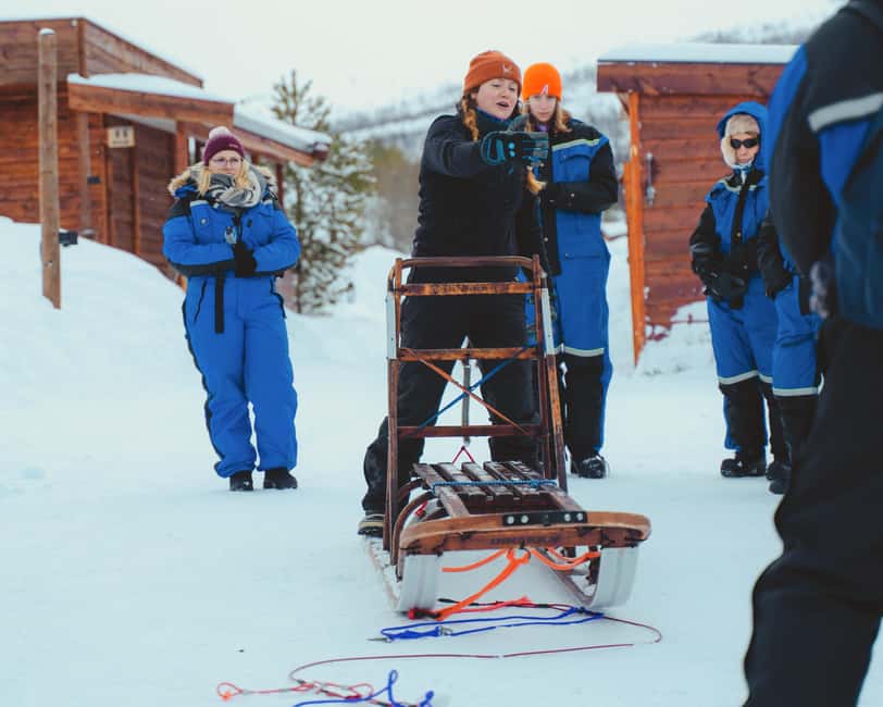 From Tromsø: Advanced Dog Sledding Daytime & Snow Park Visit - Camp Tamok gear, safety, and the moment you sit on the sled