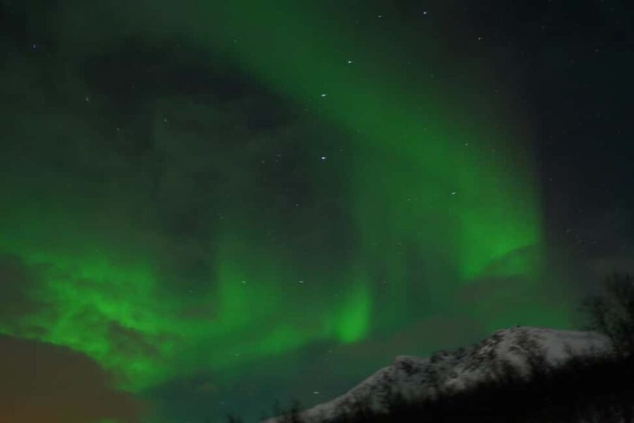 From Tromsø: Aurora Bus Tour with Snacks, Photos, and Drinks - The first stops: scenic, guided, and designed for clear skies