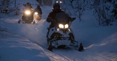 Evening Snowmobiling Tour at Camp Tamok