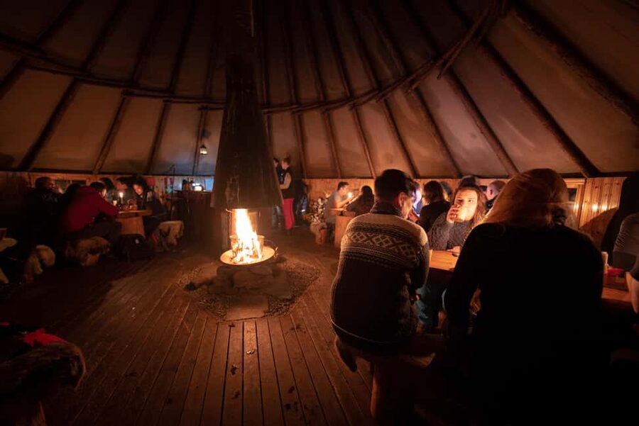 From Tromsø: Northern Lights Visit at Camp Tamok - The Sámi Lavvu Dinner: Fire-Warmed Comfort After the Sky