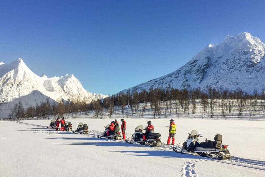 From Tromsø: Snowmobile Safari in the Lyngen Alps - At Camp Troll: gear up, get briefed, then ride