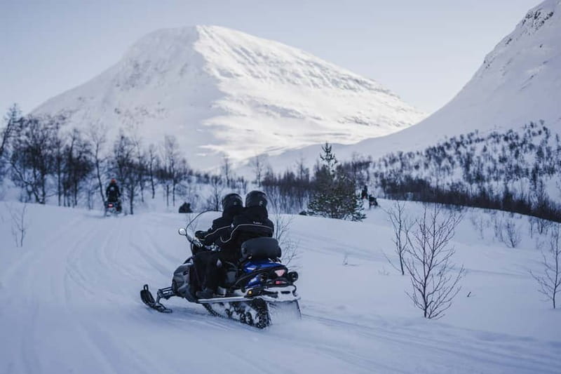 From Tromsø: Snowmobiling at Camp Tamok & Snow Park Visit - The mid-tour break in the Arctic valleys: swapping drivers and resetting your senses