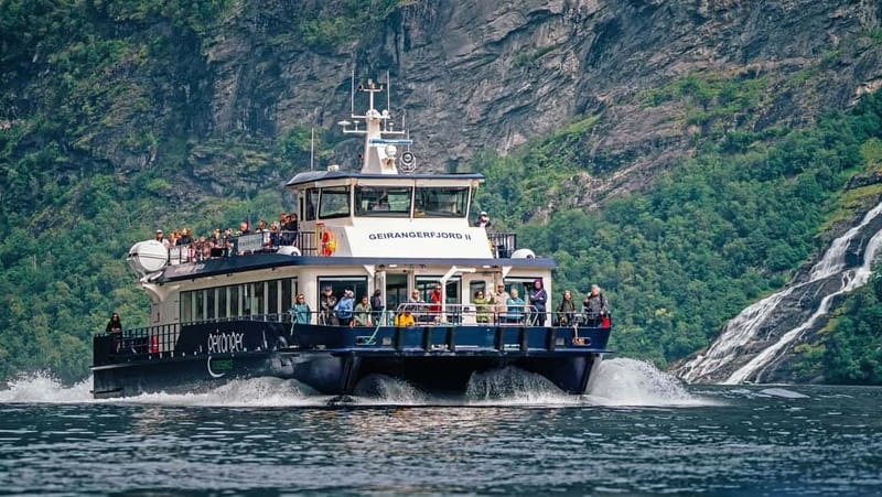 Geiranger: Fjord and Waterfalls Sightseeing Boat Trip - Hurtig Pier to the Fjord: Where You Stand Changes Everything