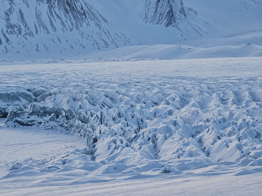 Longyearbyen: Snowmobile Tour to Tempelfjorden with Lunch - What to Bring for a Snowmobile Day in Unpredictable Arctic Weather