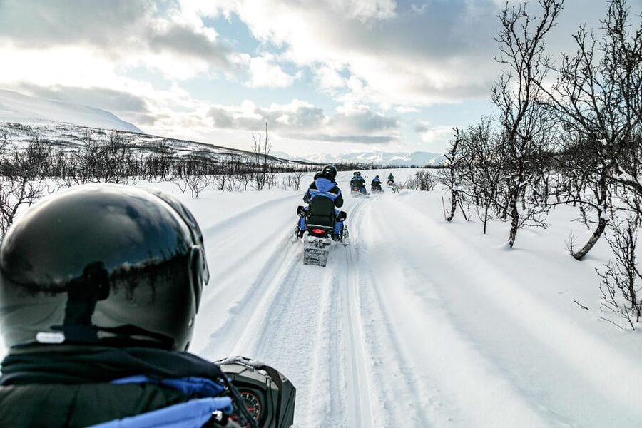 Lyngen: Snowmobile Safari with Lunch in seaside Restaurant - Finding XLyngen: Red Cabins, Sea Views, and the Meeting Spot