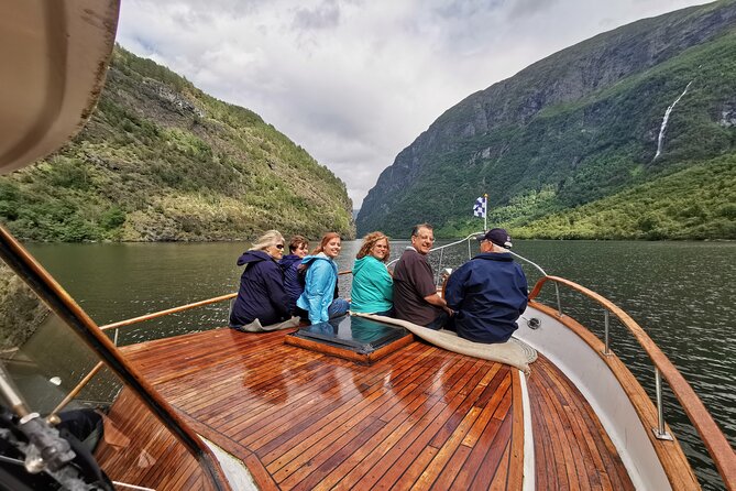 Mostraumen Private Pontoon Cruise - Vikanes church stop on the flybridge: short visit, strong atmosphere