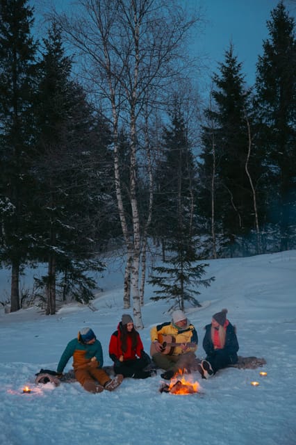 Oslo: Snowy Forest Torchlight Walk with Campfire - Food and Warmth: Small Menu, Big Emotional Payoff