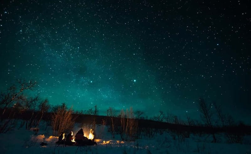 Tromsø: All inclusive Aurora Hunt with photos, food & drinks - Campsite time in thermal suits: waiting, storytelling, and science
