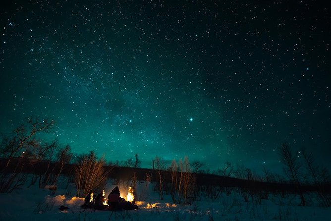 Tromso Aurora Hunt with Bonfire, Soup, Winter Gear & Transfers - How the Guide Chases the Lights Without Guaranteeing Them