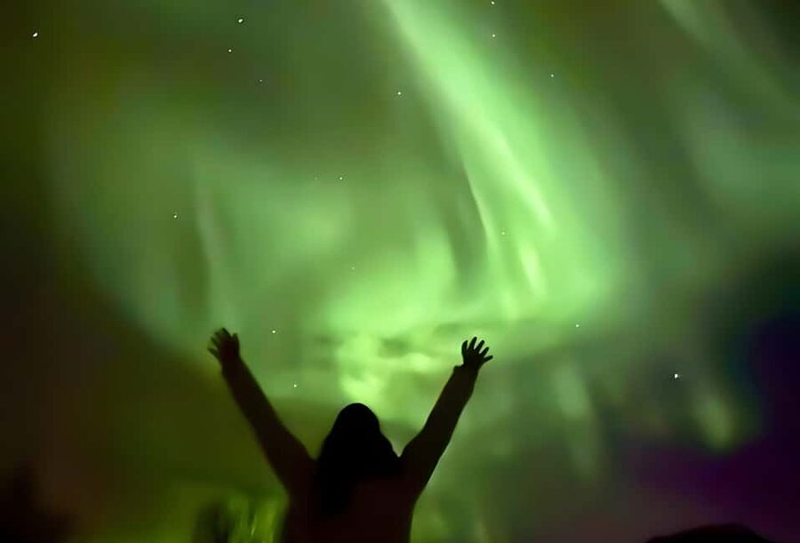 Tromsø: Northern Lights Bus Tour with Free Photography - Meeting point in Tromsø and what your night feels like before the chase begins