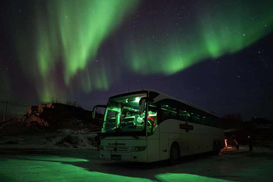 Tromsø: Northern Lights Tour with Local Stories & Photos - Stop one, Secret photo stop: the waiting game that turns into results