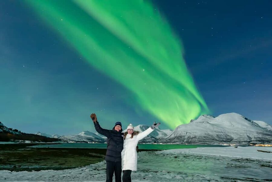 Tromsø: Northern Lights Tour with Photos, Hot Meal & Drinks - Camp time: heated tent, private toilet, and bonfire comfort