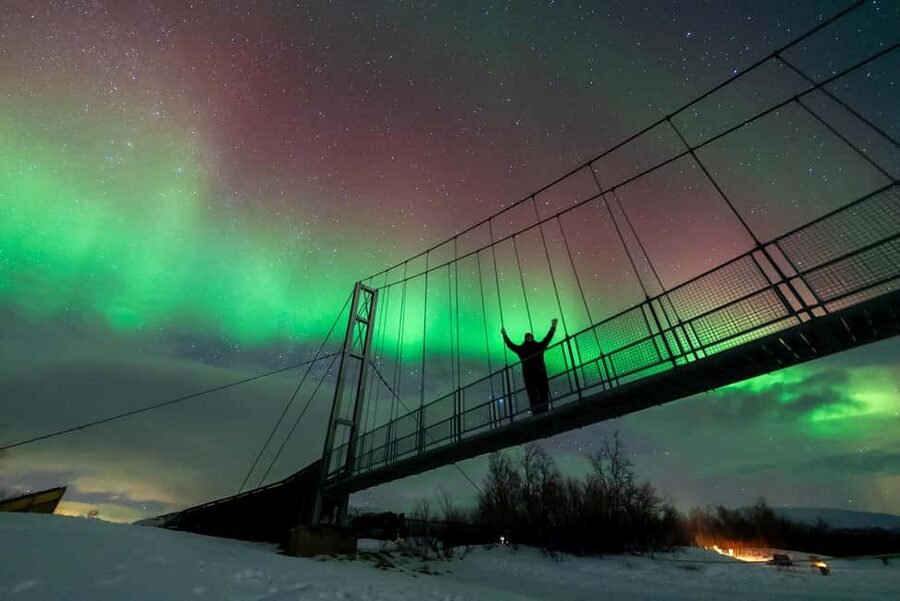 Tromsø: Northern Lights Tour with Photos, Hot Meal & Drinks - Getting ready at Ami Hotel, then warming up before you even leave