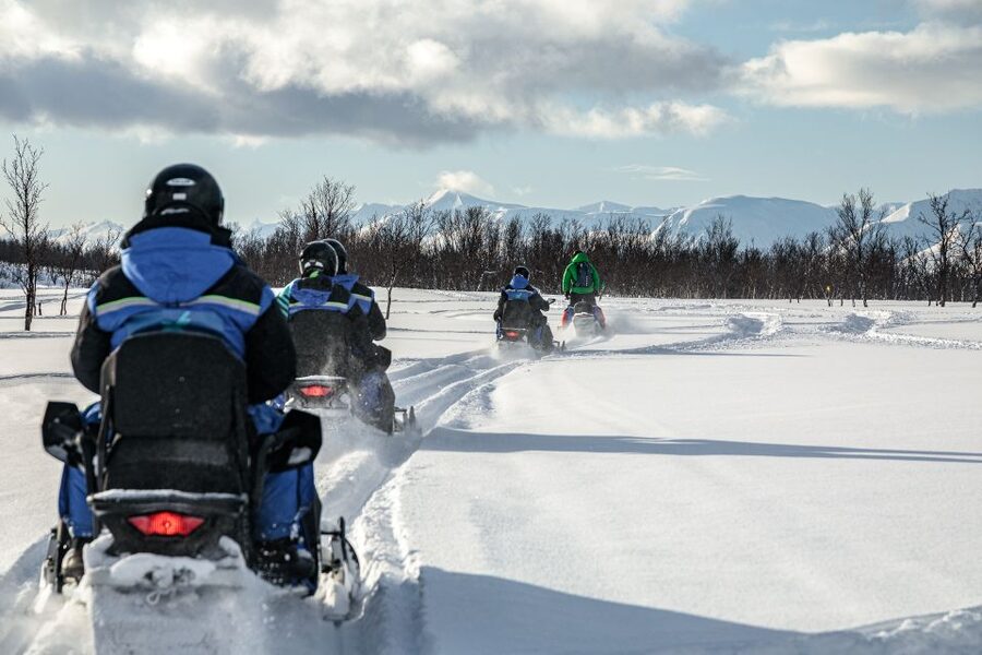 Tromsø: Scenic Arctic snowmobile safari in the Lyngen Alps - Getting there from Tromsø: bus, ferry, and Ullsfjorden views